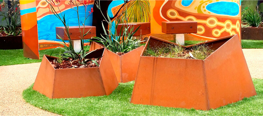 Custom shaped garden beds installation